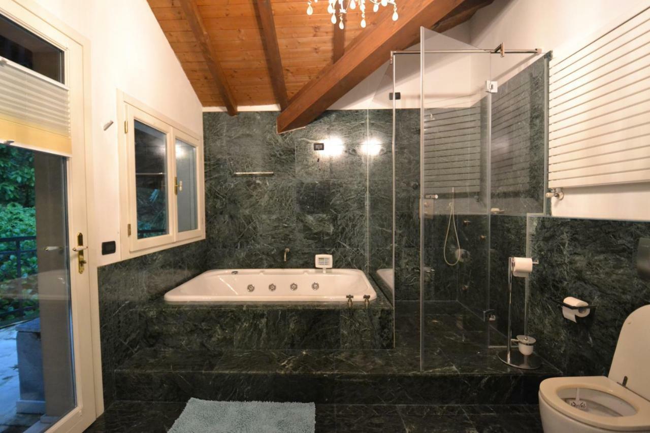 Villa Rina Deluxe And Cottage Porto Ceresio Exteriör bild